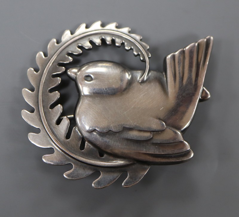 A post 1945 Georg Jensen 925 Robin on a fern frond brooch (adapted?), design no. 309, 49mm, 12 grams.